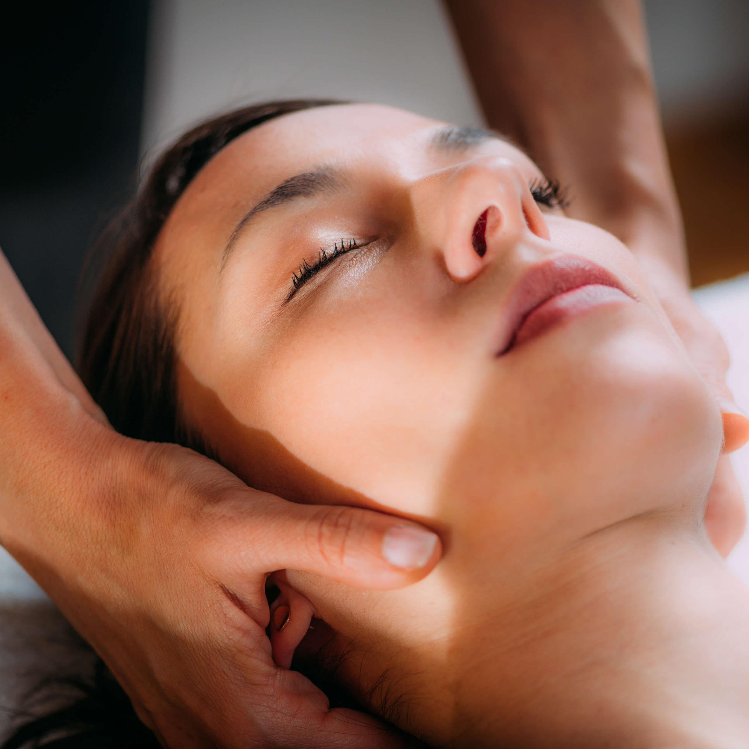 Woman receiving craniosacral therapy